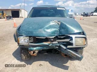 ✅ 1997 Chevrolet Blazer LS • VIN: 1GNCS13W3V2240627 • Lot: 67757765. Wystawiony na Copart z przebiegiem 218 953 mil. Bezpłatny archiwum sprzedaży aukcyjnych z USA i szczegółowy raport historii pojazdu na DreamBid. Zdjęcie 5.