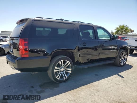 ✅ 2014 Chevrolet Suburban LS • VIN: 1GNSCHE03ER132039 • Lot: 68390234. Wystawiony na Copart z przebiegiem 129 744 mil. Bezpłatny archiwum sprzedaży aukcyjnych z USA i szczegółowy raport historii pojazdu na DreamBid. Zdjęcie 3.