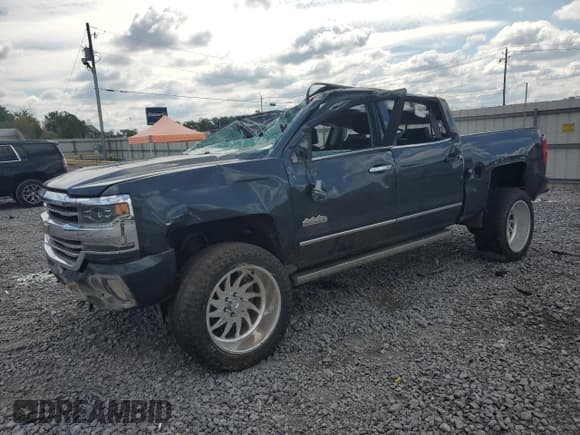 ✅ 2018 Chevrolet Silverado 1500 High Country • VIN: 3GCUKTEJ5JG438198 • Лот: 84261335. Опубликован ранее на Copart с пробегом 91 664 миль. Бесплатный доступ к архиву аукционных продаж из США и подробный отчёт об истории автомобиля на DreamBid. Изображение 1.