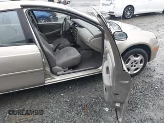 ✅ 2002 Dodge Neon • VIN: 1B3ES26C62D560602 • Lot: 43845261. Listed on IAAI with 128,369 mi. Free auction sales archive from the USA and detailed vehicle history report at DreamBid. Image 5.