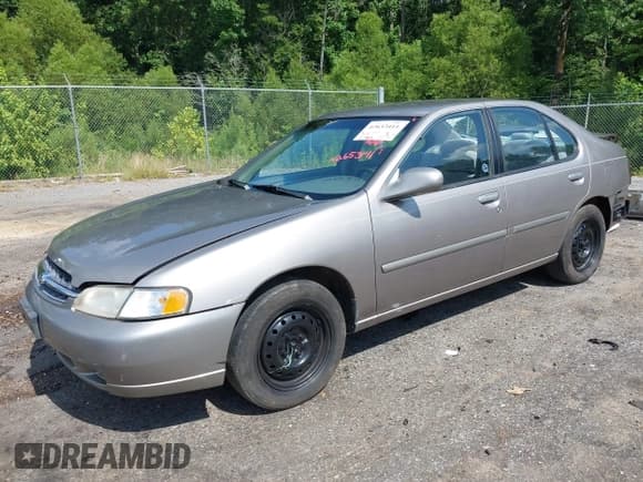 ✅ 1999 Nissan Altima XE • VIN: 1N4DL01D9XC118203 • Lot: 42653411. Wystawiony na IAAI z przebiegiem 112 099 mil. Bezpłatny archiwum sprzedaży aukcyjnych z USA i szczegółowy raport historii pojazdu na DreamBid. Zdjęcie 22.