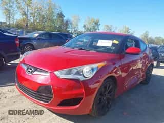 2016 Hyundai Veloster z VIN KMHTC6AD3GU256527, wystawiony jako IAAI lot #43329191 z przebiegiem 128 277 mil mil oraz . Historia ofert i sprzedaży dostępna na DreamBid. Obrazek 2.