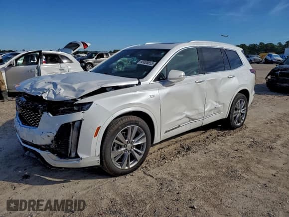 ✅ 2023 Cadillac XT6 AWD Premium Luxury • VIN: 1GYKPDRS9PZ131086 • Lot: 93308855. Wystawiony na Copart z przebiegiem 52 021 mil. Bezpłatny archiwum sprzedaży aukcyjnych z USA i szczegółowy raport historii pojazdu na DreamBid. Zdjęcie 1.