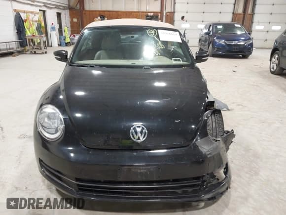 ✅ 2014 Volkswagen Beetle 1.8T • VIN: 3VW517AT5EM818796 • Lot: 42318653. Wystawiony na IAAI z przebiegiem 150 443 mil. Bezpłatny archiwum sprzedaży aukcyjnych z USA i szczegółowy raport historii pojazdu na DreamBid. Zdjęcie 12.
