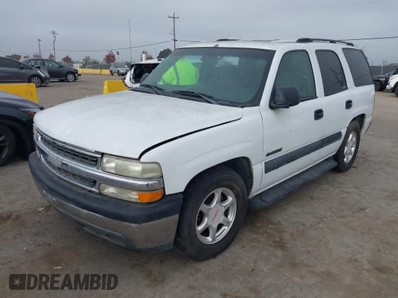 ✅ 2003 Chevrolet Tahoe LS • VIN: 1GNEC13V13J136900 • Lot: 43886921. Listed on IAAI with 226,098 mi. Free auction sales archive from the USA and detailed vehicle history report at DreamBid. Image 2.