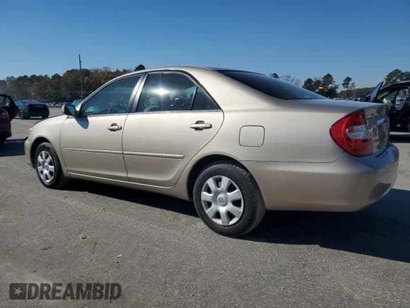 ✅ 2003 Toyota Camry LE • VIN: 4T1BE32KX3U769463 • Lot: 91556455. Listed on Copart with 116,085 mi. Free auction sales archive from the USA and detailed vehicle history report at DreamBid. Image 2.