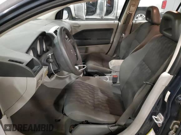 2007 Dodge Caliber with VIN 1B3HB28B37D287949, listed as a Copart auction lot 79105484 with 201,553 mi miles and Salvage title. Bid and sale history available at DreamBid. Image 7.