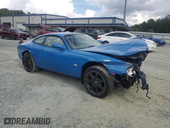 ✅ 1998 Jaguar XK • VIN: SAJJGAED3AR025857 • Lot: 84219455. Listed on Copart with Not provided. Free auction sales archive from the USA and detailed vehicle history report at DreamBid. Image 4.