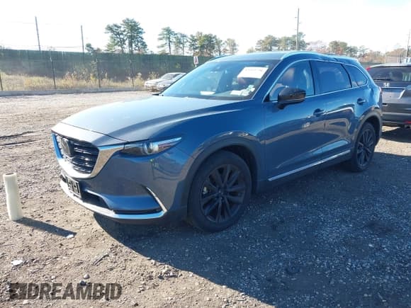 ✅ 2023 Mazda CX-9 Grand Touring • VIN: JM3TCBDY5P0655580 • Lot: 43569796. Wystawiony na IAAI z przebiegiem 26 848 mil. Bezpłatny archiwum sprzedaży aukcyjnych z USA i szczegółowy raport historii pojazdu na DreamBid. Zdjęcie 2.