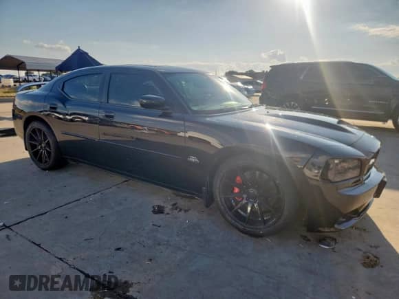 2006 Dodge Charger SRT-8 с VIN 2B3KA73W96H288105, выставлен на аукционе Copart как лот 84009015 с пробегом 83 880 миль миль и Списание • Salvage title. История ставок и продаж доступна на DreamBid. Изображение 4.