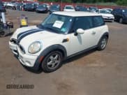 ✅ 2008 MINI Hardtop • VIN: WMWMF33528TU69137 • Lot: 42892223. Listed on IAAI with 63,213 mi. Free auction sales archive from the USA and detailed vehicle history report at DreamBid. Image 2.