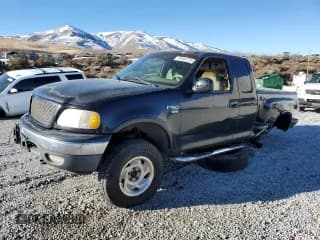 ✅ 2001 Ford F-150 XL • VIN: 1FTRX08LX1KF22433 • Lot: 87644775. Listed on Copart with 306,818 mi. Free auction sales archive from the USA and detailed vehicle history report at DreamBid. Image 1.