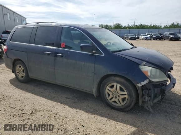 ✅ 2006 Honda Odyssey EX-L • VIN: 5FNRL38706B128265 • Лот: 58715415. Опубликован ранее на Copart с пробегом 377 656 миль. Бесплатный доступ к архиву аукционных продаж из США и подробный отчёт об истории автомобиля на DreamBid. Изображение 4.
