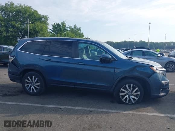 ✅ 2021 Honda Pilot EX-L • VIN: 5FNYF6H54MB031392 • Лот: 42835216. Опубликован ранее на IAAI с пробегом 48 278 миль. Бесплатный доступ к архиву аукционных продаж из США и подробный отчёт об истории автомобиля на DreamBid. Изображение 13.