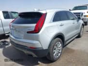 ✅ 2021 Cadillac XT4 FWD Premium Luxury • VIN: 1GYFZCR42MF005253 • Лот: 40470700. Опубликован ранее на IAAI с пробегом 70 571 миль. Бесплатный доступ к архиву аукционных продаж из США и подробный отчёт об истории автомобиля на DreamBid. Изображение 4.