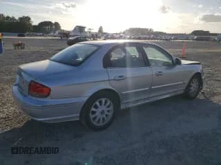 ✅ 2005 Hyundai Sonata GLS • VIN: KMHWF35H95A116657 • Лот: 77614154. Опубликован ранее на Copart с пробегом 101 164 миль. Бесплатный доступ к архиву аукционных продаж из США и подробный отчёт об истории автомобиля на DreamBid. Изображение 3.