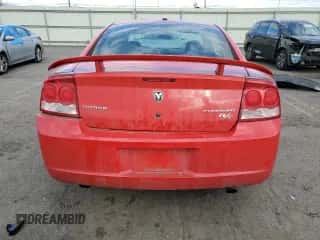 2010 Dodge Charger R/T с VIN 2B3CA8CT2AH316741, выставлен на аукционе Copart как лот 76374874 с пробегом 107 469 миль миль и Списание • Salvage title. История ставок и продаж доступна на DreamBid. Изображение 6.