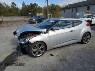 2017 Hyundai Veloster Value Edition с VIN KMHTC6AD2HU324236, выставлен на аукционе Copart как лот 87278585 с пробегом Не указан миль и Чистый • Clean title. История ставок и продаж доступна на DreamBid. Изображение 1.