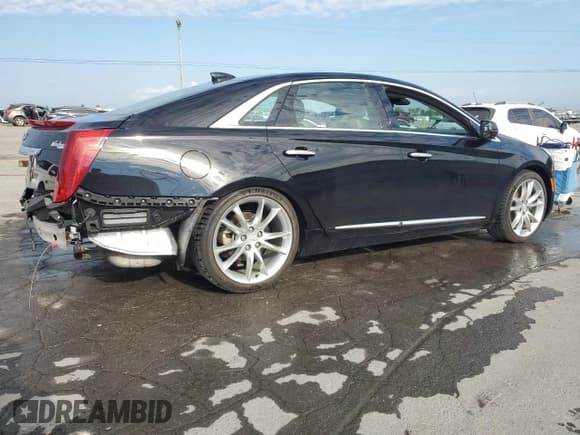 ✅ 2016 Cadillac XTS Premium Collection • VIN: 2G61P5S34G9154587 • Лот: 71019605. Опубликован ранее на Copart с пробегом 91 708 миль. Бесплатный доступ к архиву аукционных продаж из США и подробный отчёт об истории автомобиля на DreamBid. Изображение 3.