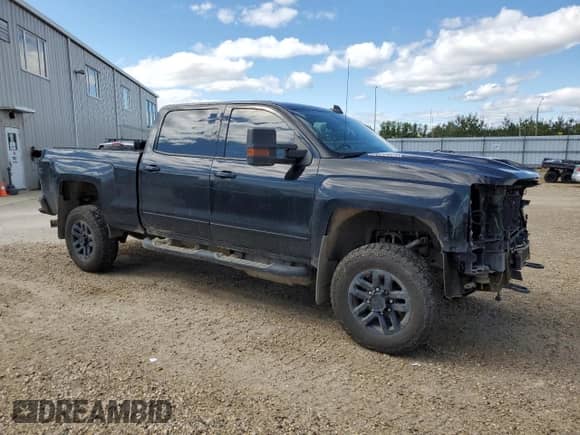 2017 Chevrolet Silverado 3500HD LTZ with VIN 1GC4K0EY3HF184708, listed as a Copart auction lot 68829495 with 251,642 mi miles and Salvage title. Bid and sale history available at DreamBid. Image 4.