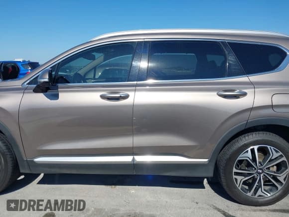 ✅ 2019 Hyundai Santa Fe Limited • VIN: 5NMS5CAA8KH036668 • Лот: 43544647. Опубликован ранее на IAAI с пробегом 82 738 миль. Бесплатный доступ к архиву аукционных продаж из США и подробный отчёт об истории автомобиля на DreamBid. Изображение 15.