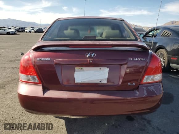 ✅ 2001 Hyundai Elantra GLS • VIN: KMHDN45D41U107399 • Lot: 52658745. Wystawiony na Copart z przebiegiem 65 459 mil. Bezpłatny archiwum sprzedaży aukcyjnych z USA i szczegółowy raport historii pojazdu na DreamBid. Zdjęcie 6.