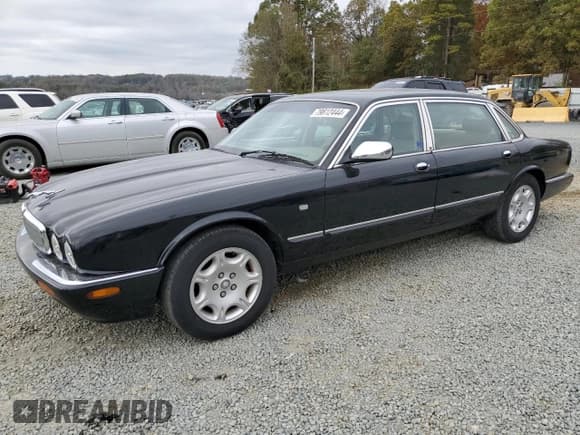 ✅ 2003 Jaguar XJ Vanden Plas • VIN: SAJDA24CX3LF55964 • Lot: 79812444. Listed on Copart with 173,281 mi. Free auction sales archive from the USA and detailed vehicle history report at DreamBid. Image 1.
