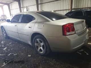2010 Dodge Charger SXT с VIN 2B3CA3CVXAH231652, выставлен на аукционе Copart как лот 77903704 с пробегом 174 873 миль миль и Списание • Salvage title. История ставок и продаж доступна на DreamBid. Изображение 2.