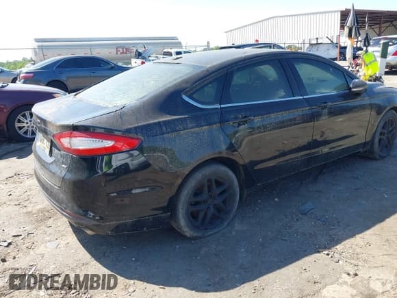 ✅ 2016 Ford Fusion SE • VIN: 3FA6P0H70GR308373 • Lot: 42036408. Listed on IAAI with 216,518 mi. Free auction sales archive from the USA and detailed vehicle history report at DreamBid. Image 4.