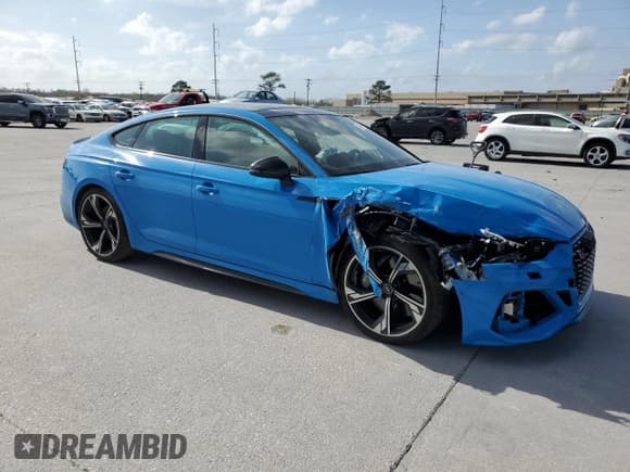 ✅ 2022 Audi RS 5 Sportback • VIN: WUAAWCF57NA901071 • Lot: 41744493. Listed on Copart with 12,409 mi. Free auction sales archive from the USA and detailed vehicle history report at DreamBid. Image 4.