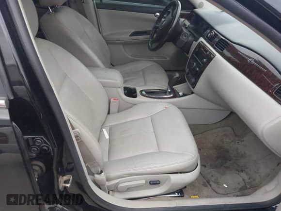 2013 Chevrolet Impala LTZ with VIN 2G1WC5E39D1194399, listed as a IAAI auction lot 43538551 with 128,896 mi miles and . Bid and sale history available at DreamBid. Image 5.