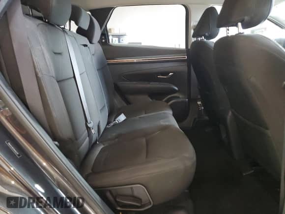 2022 Hyundai Tucson SE with VIN 5NMJA3AE5NH052759, listed as a Copart auction lot 90626665 with 58,295 mi miles and Salvage title. Bid and sale history available at DreamBid. Image 11.