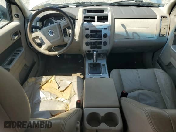 2009 Mercury Mariner with VIN 4M2CU81799KJ24372, listed as a Copart auction lot 65468924 with 123,284 mi miles and Salvage title. Bid and sale history available at DreamBid. Image 8.