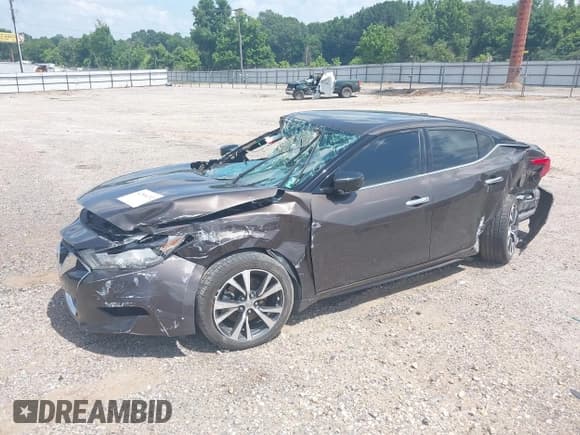 ✅ 2016 Nissan Maxima SR • VIN: 1N4AA6AP7GC435306 • Lot: 42504232. Listed on IAAI with 133,372 mi. Free auction sales archive from the USA and detailed vehicle history report at DreamBid. Image 2.