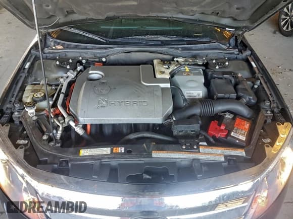 ✅ 2010 Ford Fusion Hybrid • VIN: 3FADP0L30AR133285 • Лот: 94795225. Опубликован ранее на Copart с пробегом 63 801 миль. Бесплатный доступ к архиву аукционных продаж из США и подробный отчёт об истории автомобиля на DreamBid. Изображение 11.