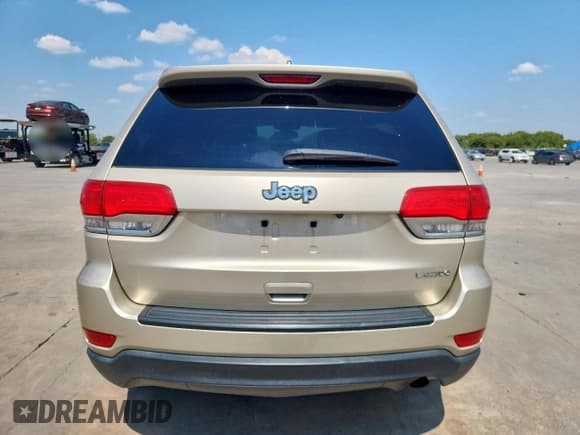 ✅ 2014 Jeep Grand Cherokee Laredo • VIN: 1C4RJEAG8EC386864 • Lot: 80836585. Listed on Copart with 293,610 mi. Free auction sales archive from the USA and detailed vehicle history report at DreamBid. Image 6.