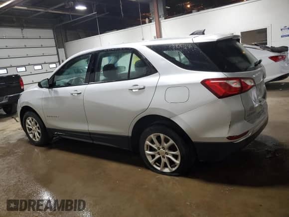 2018 Chevrolet Equinox LS с VIN 2GNAXREV9J6227986, выставлен на аукционе Copart как лот 89443525 с пробегом 98 497 миль миль и Чистый • Clean title. История ставок и продаж доступна на DreamBid. Изображение 2.