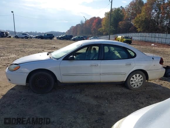 ✅ 2006 Ford Taurus SE • VIN: 1FAFP53UX6A139742 • Lot: 43701399. Listed on IAAI with 252,993 mi. Free auction sales archive from the USA and detailed vehicle history report at DreamBid. Image 14.