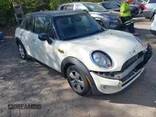 ✅ 2016 MINI Hardtop 4 Door • VIN: WMWXU1C5XG2D09554 • Lot: 43414237. Wystawiony na IAAI z przebiegiem 126 478 mil. Bezpłatny archiwum sprzedaży aukcyjnych z USA i szczegółowy raport historii pojazdu na DreamBid. Zdjęcie 1.