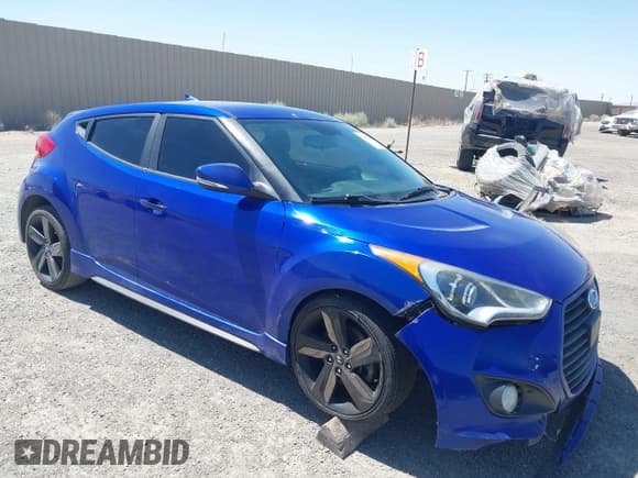 ✅ 2015 Hyundai Veloster Turbo • VIN: KMHTC6AE2FU218570 • Lot: 42609097. Wystawiony na IAAI z przebiegiem 104 965 mil. Bezpłatny archiwum sprzedaży aukcyjnych z USA i szczegółowy raport historii pojazdu na DreamBid. Zdjęcie 1.