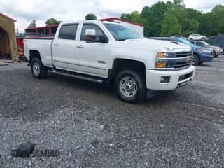 ✅ 2018 Chevrolet Silverado 2500HD High Country • VIN: 1GC1KXEY0JF255624 • Лот: 42353659. Опубликован ранее на IAAI с пробегом 252 041 миль. Бесплатный доступ к архиву аукционных продаж из США и подробный отчёт об истории автомобиля на DreamBid. Изображение 1.
