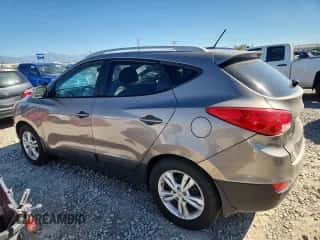 2013 Hyundai Tucson GLS z VIN KM8JUCACXDU553283, wystawiony jako Copart lot #84033505 z przebiegiem 153 718 mil mil oraz Czysty tytuł • Clean title. Historia ofert i sprzedaży dostępna na DreamBid. Obrazek 2.