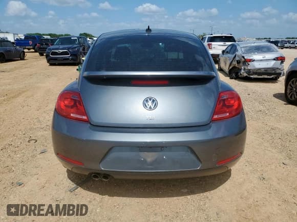 ✅ 2014 Volkswagen Beetle 2.0L TDI w/Sun/Sound/Nav • VIN: 3VWJL7AT2EM634232 • Лот: 64551775. Опубликован ранее на Copart с пробегом Не указан. Бесплатный доступ к архиву аукционных продаж из США и подробный отчёт об истории автомобиля на DreamBid. Изображение 6.
