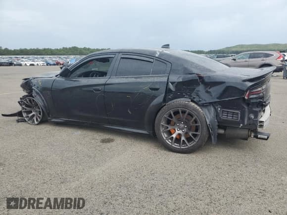 ✅ 2022 Dodge Charger SRT Hellcat Widebody • VIN: 2C3CDXL97NH163644 • Лот: 62159065. Опубликован ранее на Copart с пробегом 21 814 миль. Бесплатный доступ к архиву аукционных продаж из США и подробный отчёт об истории автомобиля на DreamBid. Изображение 2.