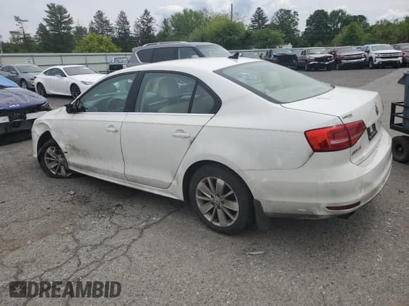 ✅ 2015 Volkswagen Jetta SE • VIN: 3VWD17AJ2FM255590 • Lot: 58287585. Listed on Copart with 124,640 mi. Free auction sales archive from the USA and detailed vehicle history report at DreamBid. Image 2.
