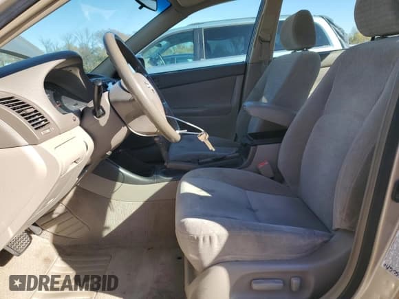 ✅ 2002 Toyota Camry LE • VIN: JTDBE32K520020340 • Lot: 91112395. Listed on Copart with 140,537 mi. Free auction sales archive from the USA and detailed vehicle history report at DreamBid. Image 7.