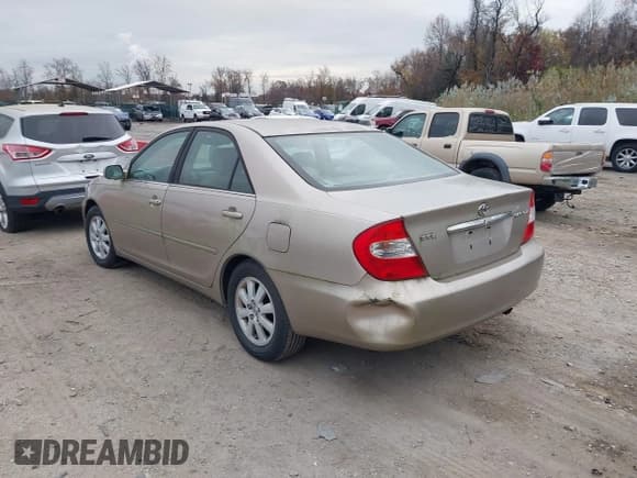 ✅ 2003 Toyota Camry XLE • VIN: 4T1BE30K43U244188 • Lot: 43740977. Wystawiony na IAAI z przebiegiem 116 071 mil. Bezpłatny archiwum sprzedaży aukcyjnych z USA i szczegółowy raport historii pojazdu na DreamBid. Zdjęcie 3.