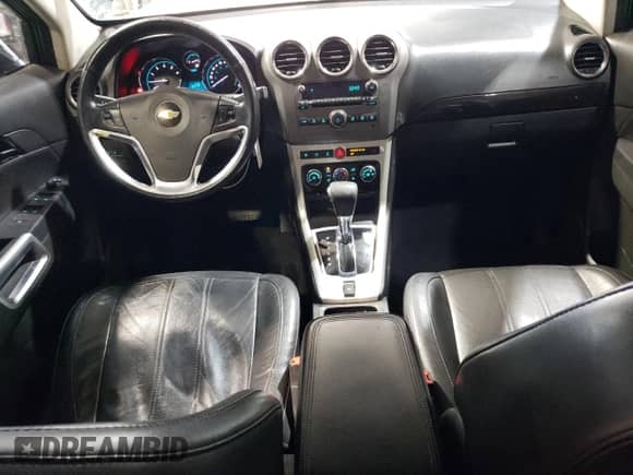 2015 Chevrolet Captiva Sport LTZ с VIN 3GNAL4EK0FS503873, выставлен на аукционе Copart как лот 84217534 с пробегом 111 432 миль миль и Списание • Salvage title. История ставок и продаж доступна на DreamBid. Изображение 8.