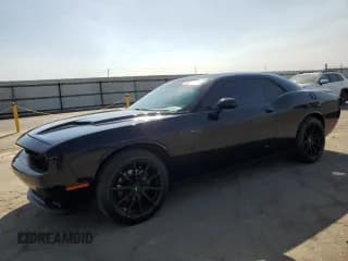 ✅ 2016 Dodge Challenger SXT Plus • VIN: 2C3CDZAG2GH130938 • Lot: 69314754. Wystawiony na Copart z przebiegiem 77 941 mil. Bezpłatny archiwum sprzedaży aukcyjnych z USA i szczegółowy raport historii pojazdu na DreamBid. Zdjęcie 1.