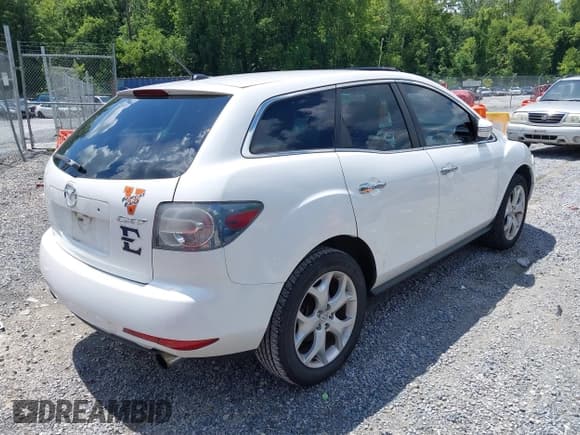 ✅ 2010 Mazda CX-7 Touring • VIN: JM3ER2W35A0333649 • Лот: 42859546. Опубликован ранее на IAAI с пробегом 176 997 миль. Бесплатный доступ к архиву аукционных продаж из США и подробный отчёт об истории автомобиля на DreamBid. Изображение 4.
